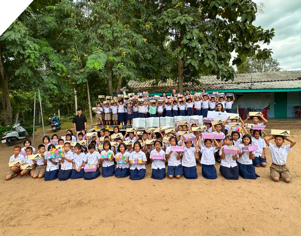 PL Builds the Foundation for Learning: Donating Shoes and Computers in Tak Province